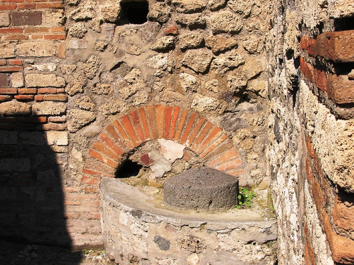 Roman bread oven, ancient bakery, golden hour light