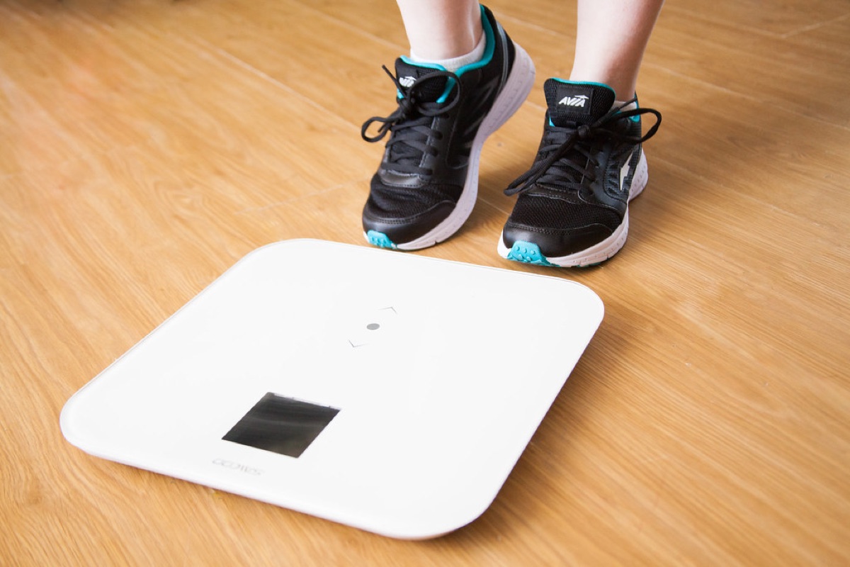 Digital scale, flour measuring, kitchen counter, soft light