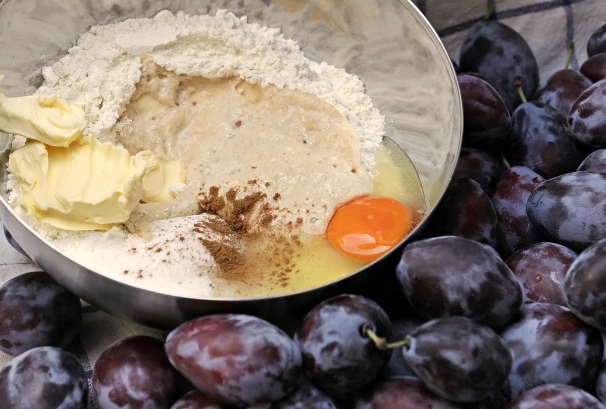 Cold dough on a glossy kitchen counter